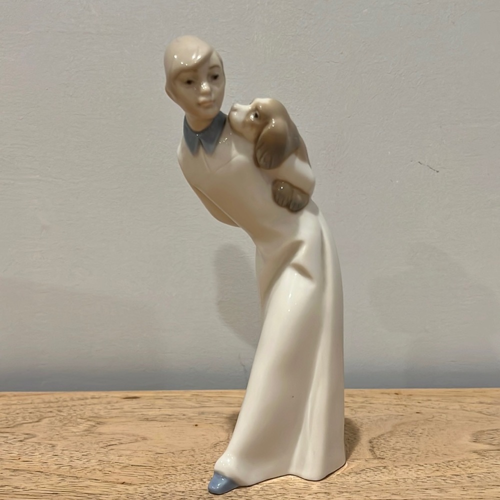 Spanish Porcelain Figurine Boy with dog on his Back